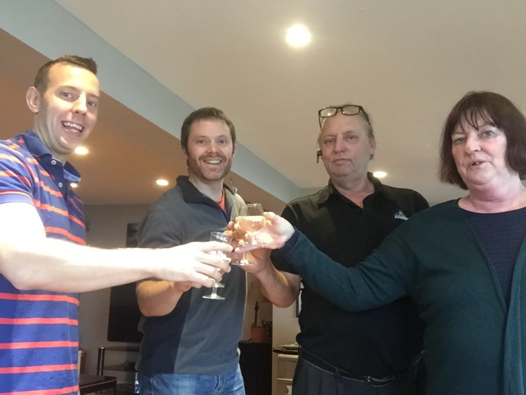 Me, Mark, my Dad, and Linda having a celebratory toast after the official sale of the business.